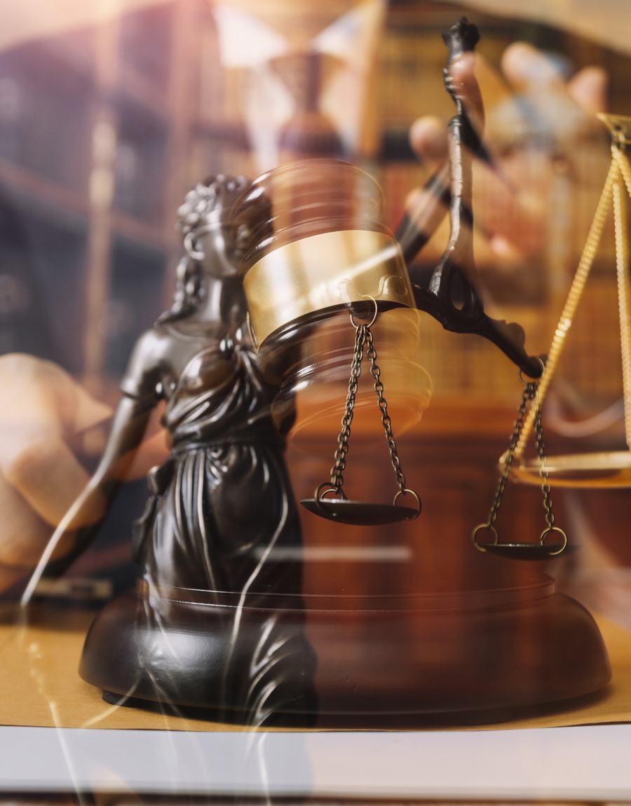 Scales of justice and gavel in a Virginia courtroom